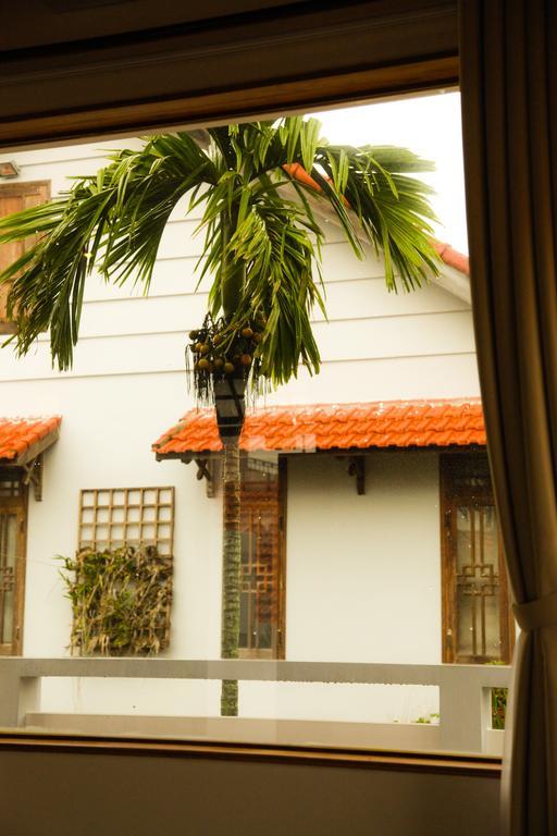 Charming Homestay Хойан Экстерьер фото